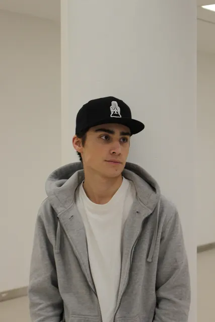 model wearing the rivo cap